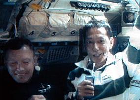 Japanese mission specialist communicates from shuttle